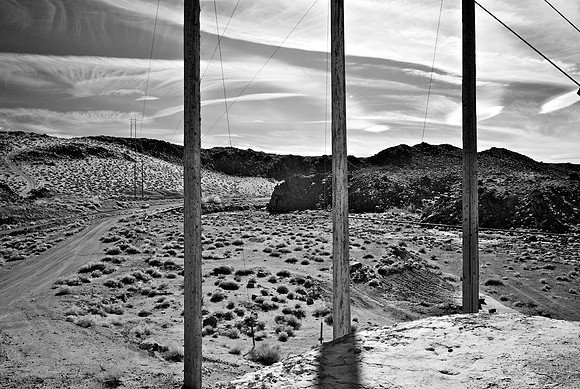 Three Utility Poles with Passing Car - Trona, CA - 2014